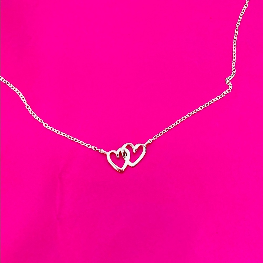 Silver hearts necklace never worn